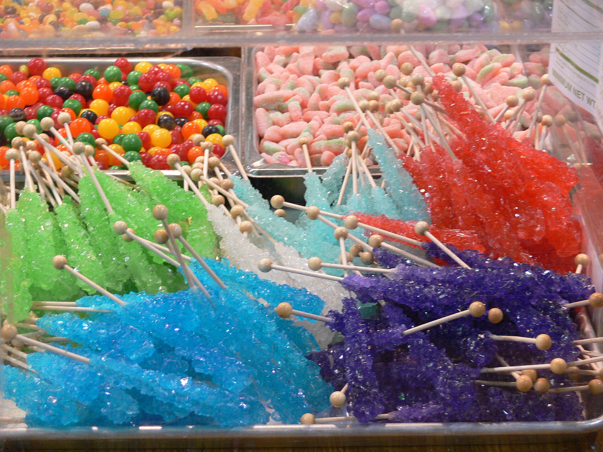 Rock candy (in the foreground) and other candy on sale at the Texas State Fair 2008, Dallas, Texas