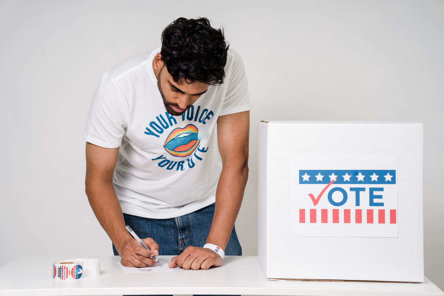 Poll workers and voters at a general polling station