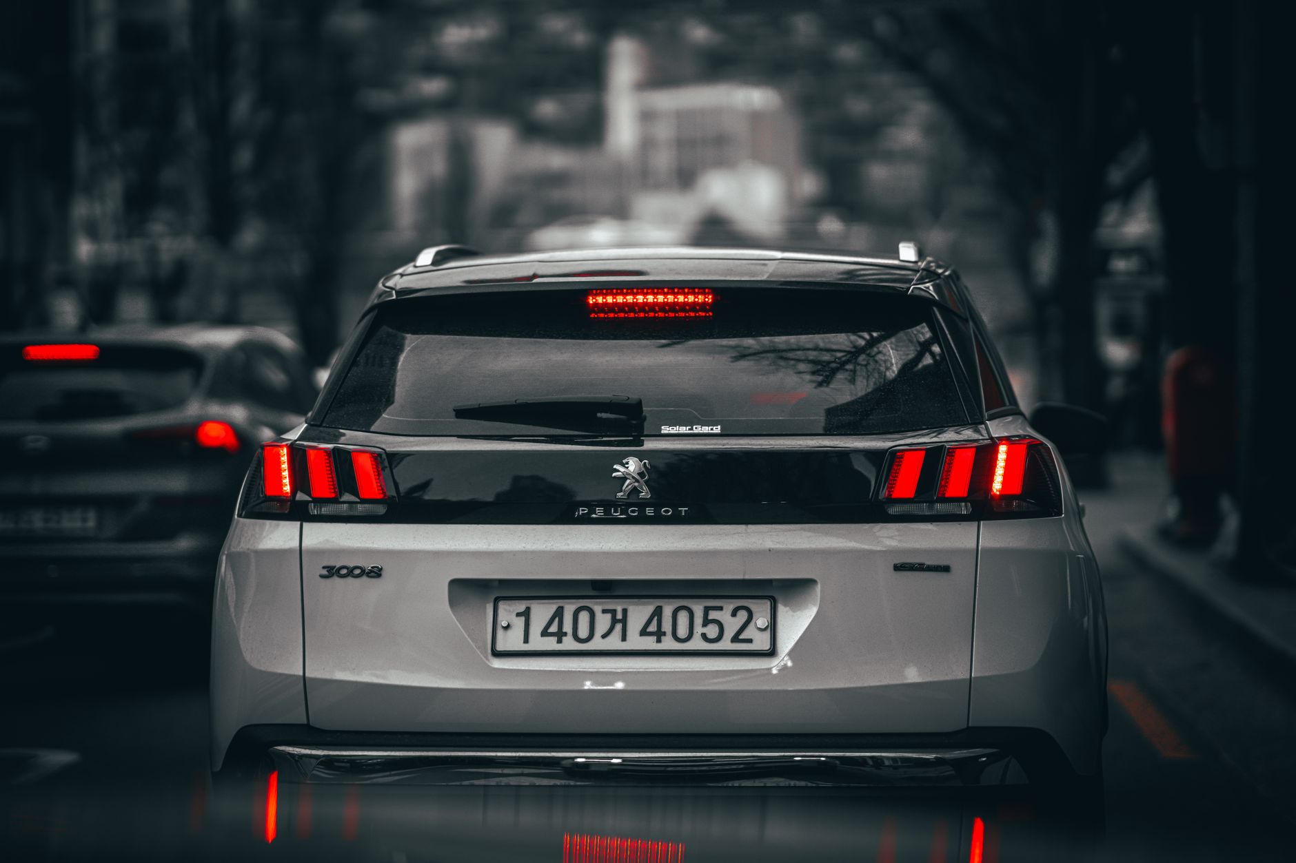 Gasoline SUV driving on a multi-lane road