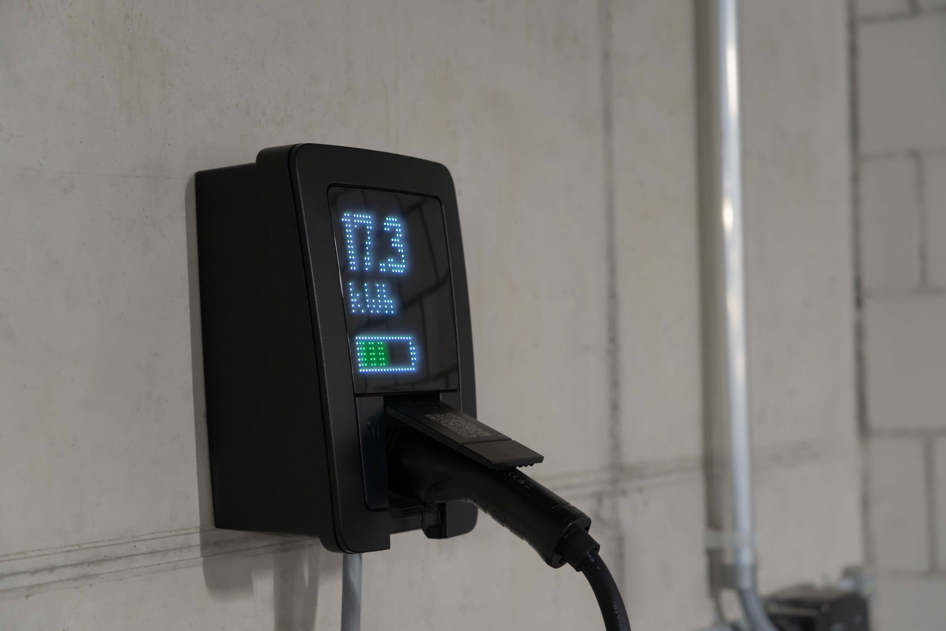 Electric vehicle charging at a public charging station